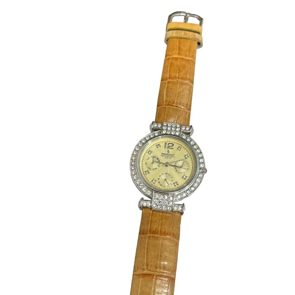 P. PEUGEOT YELLOW FACE & CROCODILE STAMPED BAND WITH CRYSTAL BEZEL WATCH